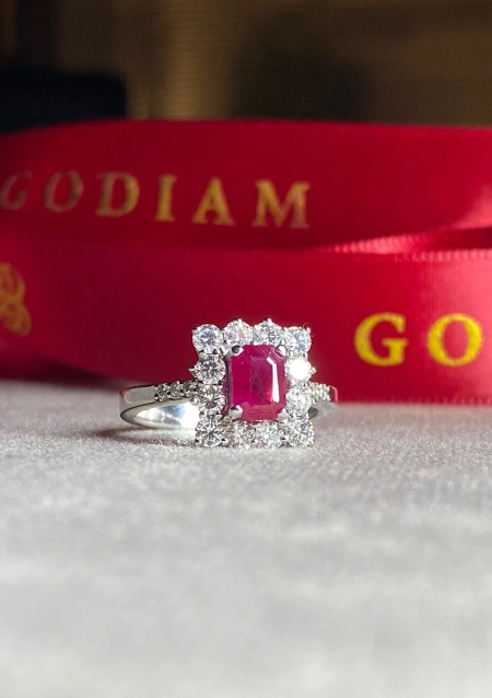 BUGANVILLA 18K white gold diamonds and ruby rosette ring.
