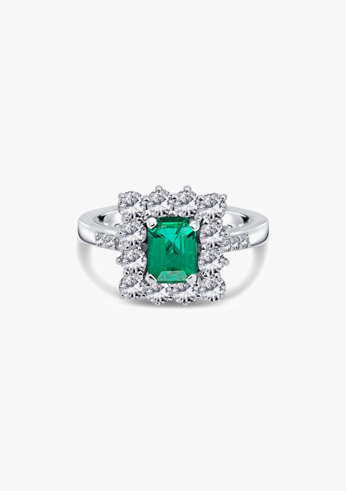 Anel BUGANVILLA ouro branco 18K com diamantes e esmeralda.