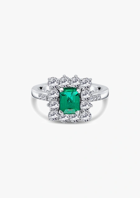 Anel BUGANVILLA ouro branco 18K com diamantes e esmeralda.