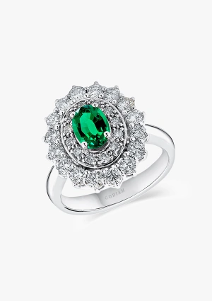 ELIZABETH 18K white gold with brilliant cut diamonds crowned by a colombian emerald