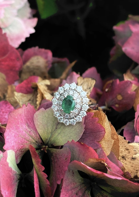 ELIZABETH 18K white gold with diamonds and emerald ring.
