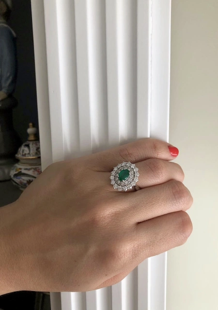 ELIZABETH 18K white gold with diamonds and emerald ring.