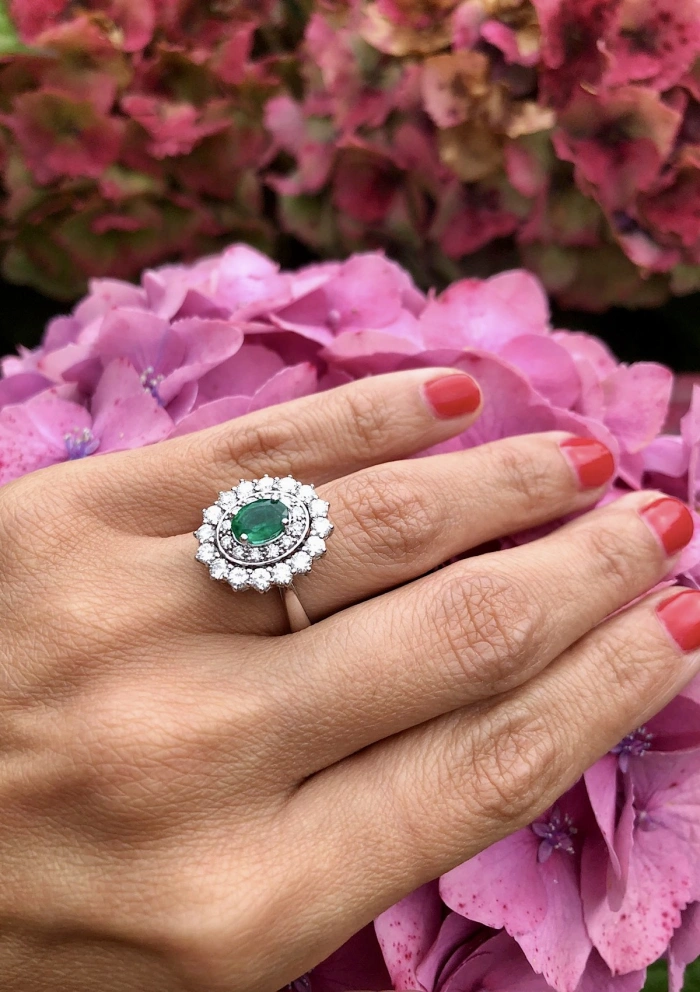 ELIZABETH 18K white gold with diamonds and emerald ring.