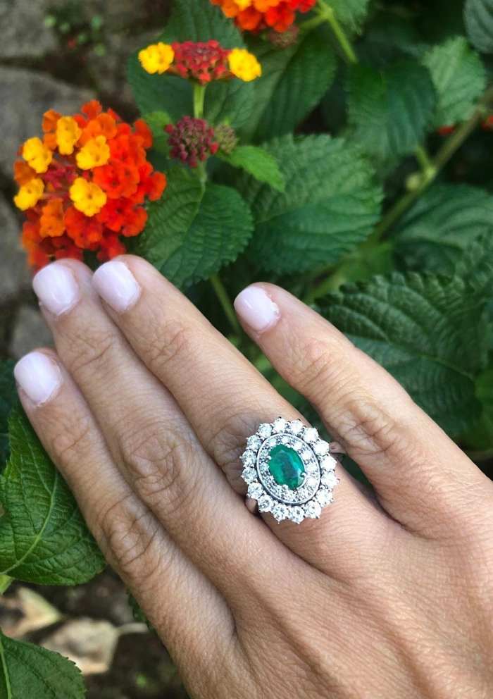 ELIZABETH 18K white gold with diamonds and emerald ring.
