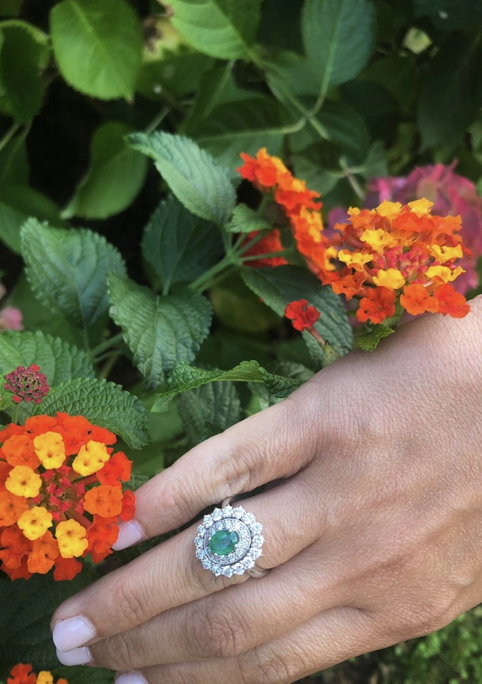 ELIZABETH 18K white gold with diamonds and emerald ring.
