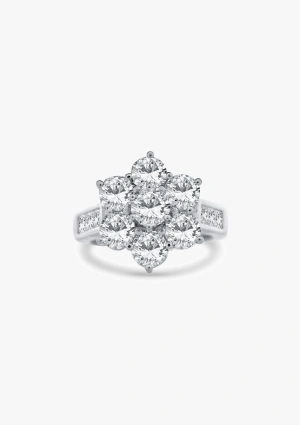 Anillo MADRID en oro blanco 18K con orla de diamantes talla brillante y princesas