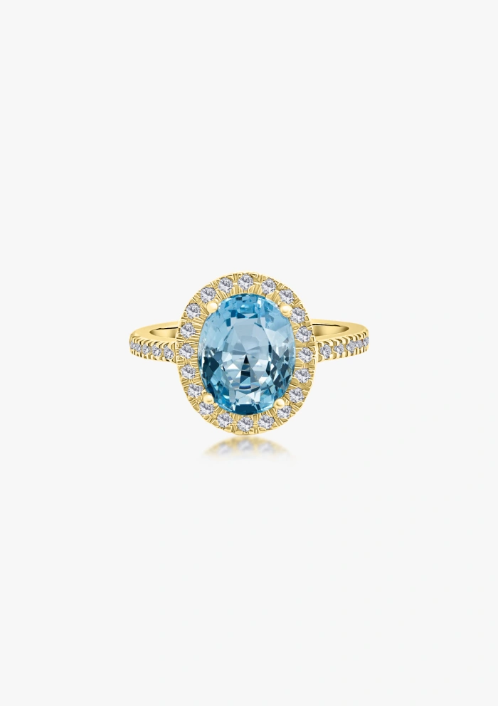 Anillo ELSA en oro amarillo 18K con halo de diamantes y aguamarina|Anillos con Aguamarinas|Godiam Alta Joyería