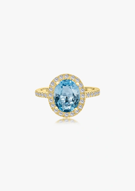 Anillo ELSA en oro amarillo 18K con halo de diamantes y aguamarina|Anillos con Aguamarinas|Godiam Alta Joyería
