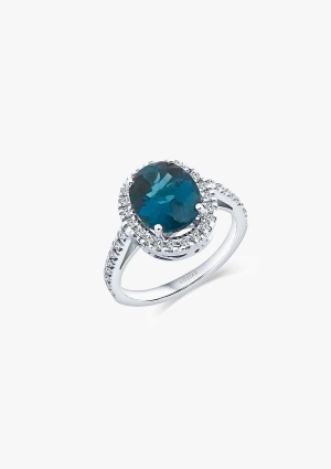 ELSA 18K white gold with brilliant cut diamonds crowned by an oval cut London Blue topaz halo ring