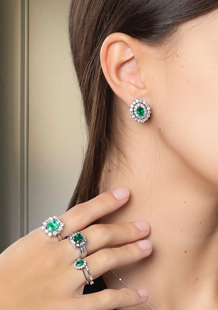 ELIZABETH 18K white gold diamonds and emeralds earrings.