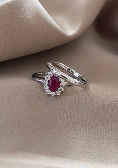 UNITY 18K white gold with a single diamond wedding band