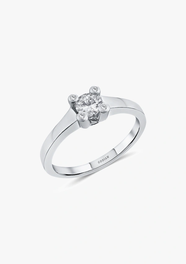 Bague solitaire SARA en or blanc 18K et diamants taille brillant