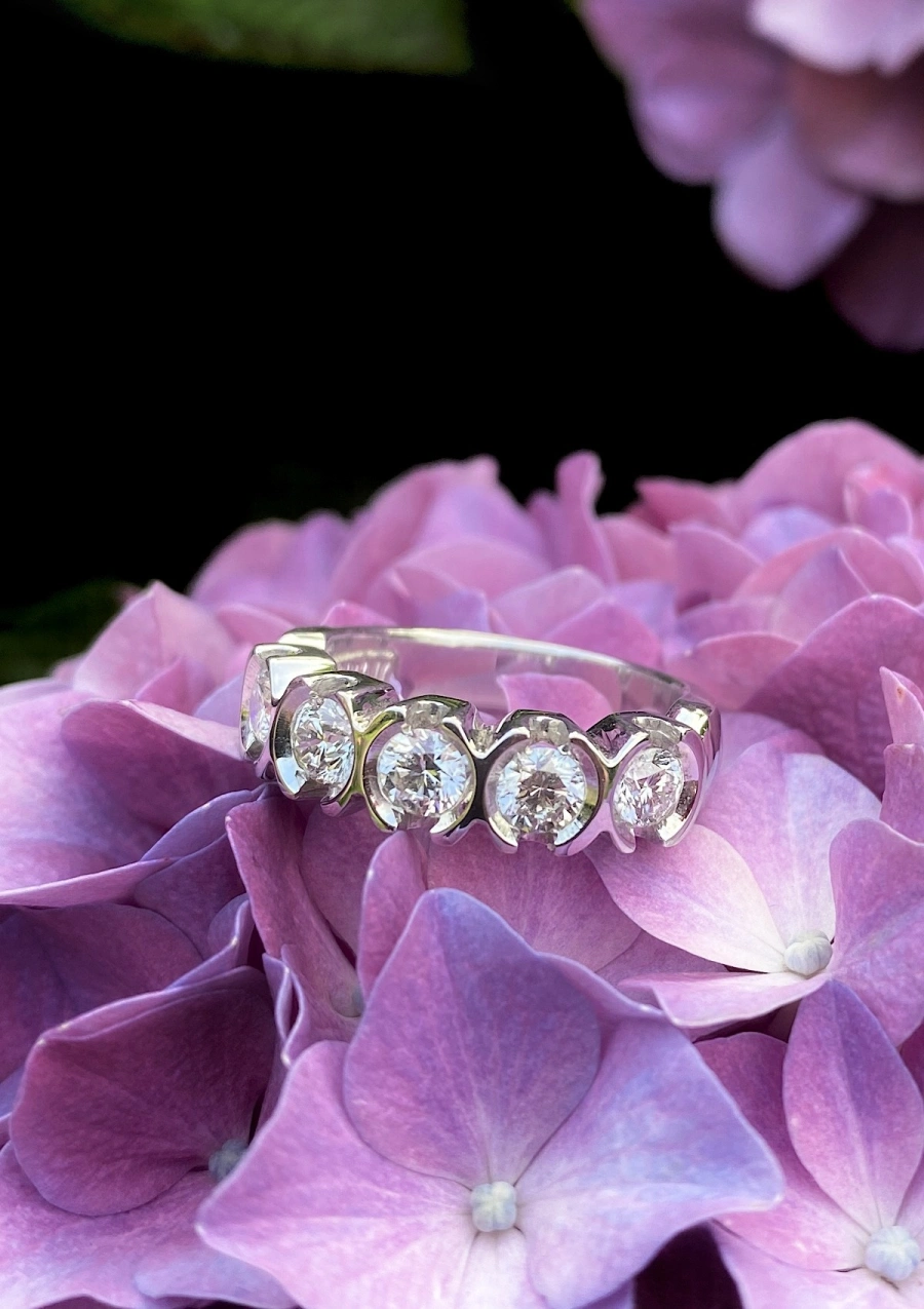 CLARA 18K white gold diamond half eternity wedding ring.