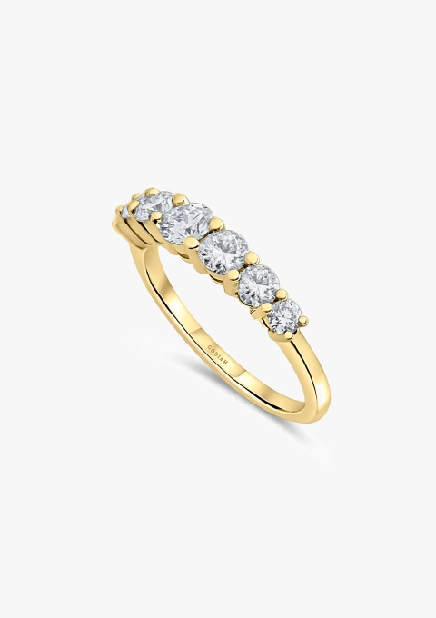 Anel meia aliança MACARENA em ouro 18K com 7 diamantes de lapidação brilhante em degradê