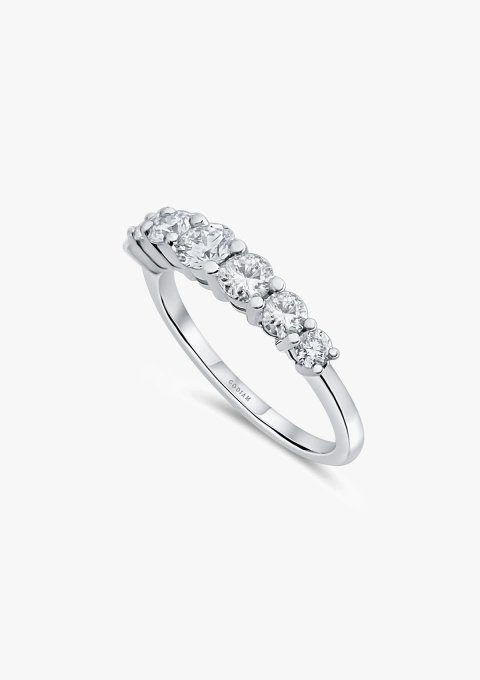 Bague demi alliance MACARENA en or 18K et diamants.