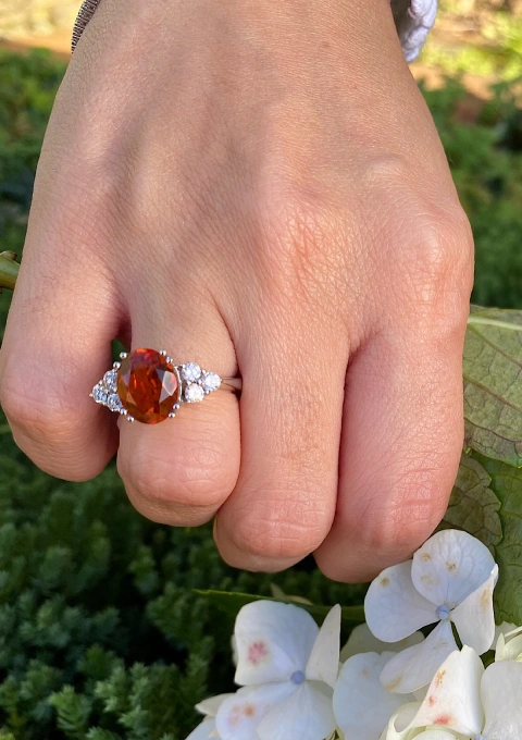GALILEA 18K white gold ring with diamonds and orange topaz.