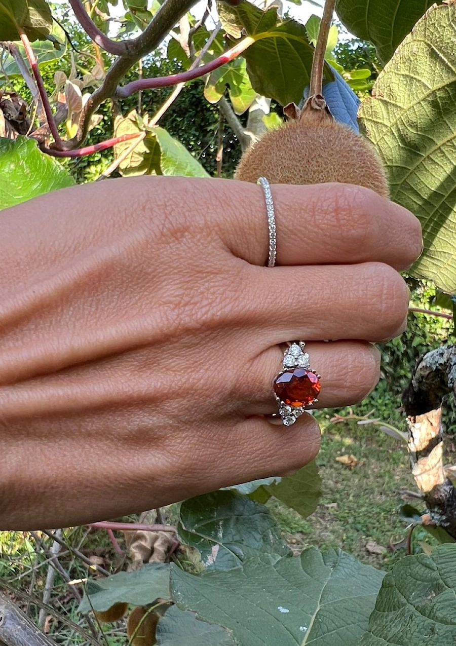 GALILEA 18K white gold ring with diamonds and orange topaz.