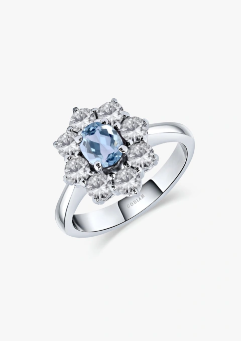 SIMONETA 18K white gold ring with a rosette of brilliant cut diamonds crowned with an oval cut aquamarine