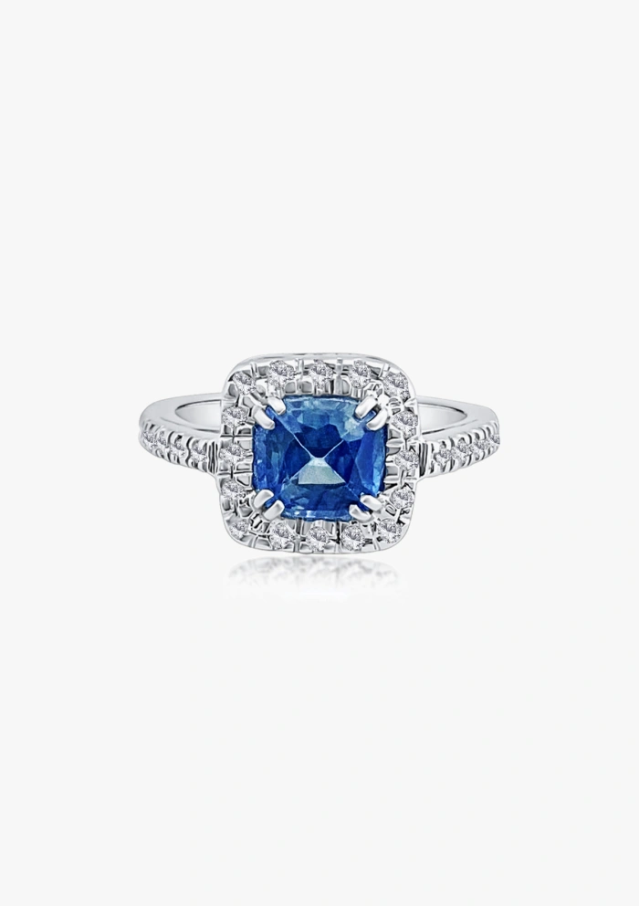 MYANMAR 18K white gold diamond and blue sapphire halo ring.