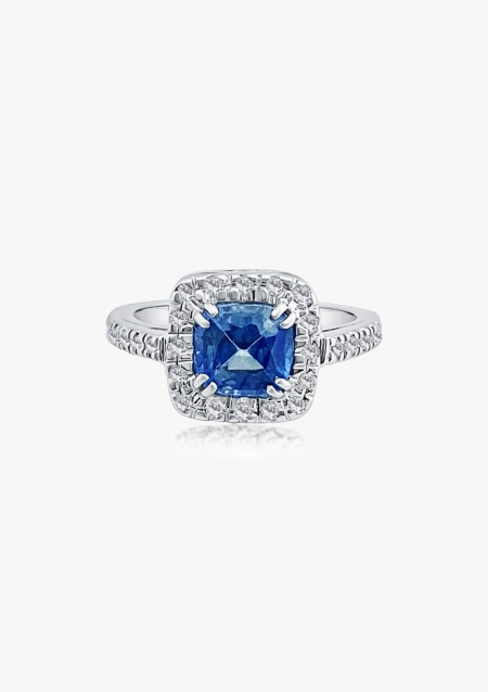 MYANMAR 18K white gold diamond and blue sapphire halo ring.