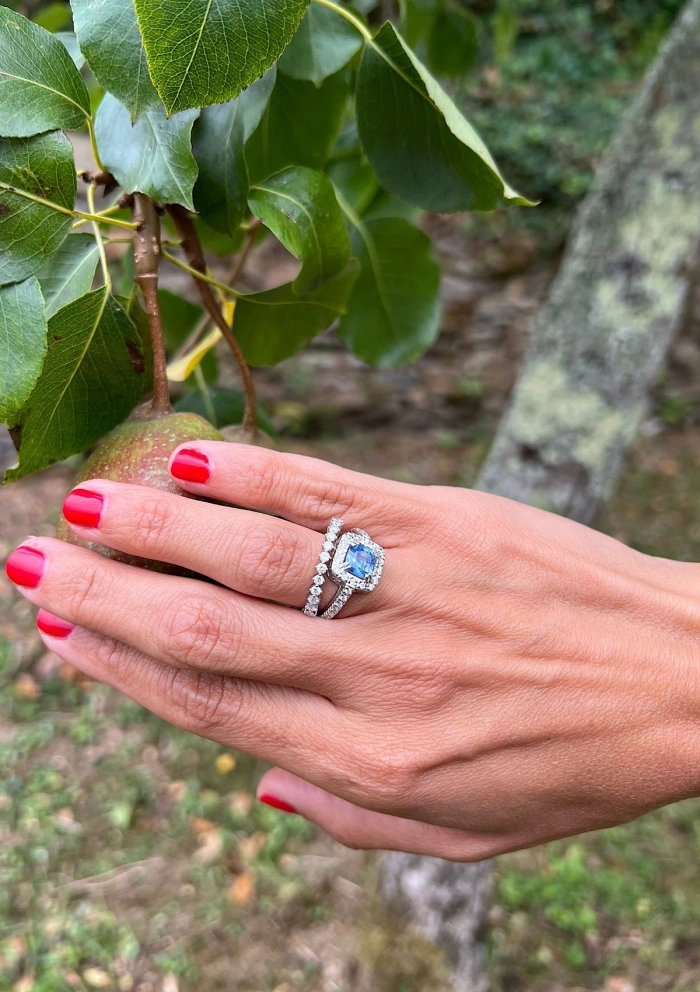 MYANMAR 18K white gold diamond and blue sapphire halo ring.