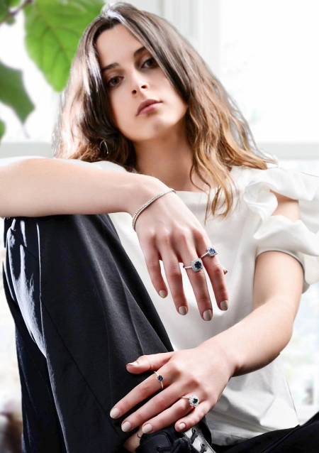 MYANMAR 18K white gold diamond and blue sapphire halo ring.