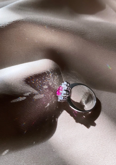SIMONETA 18K white gold diamonds and ruby rosette ring.
