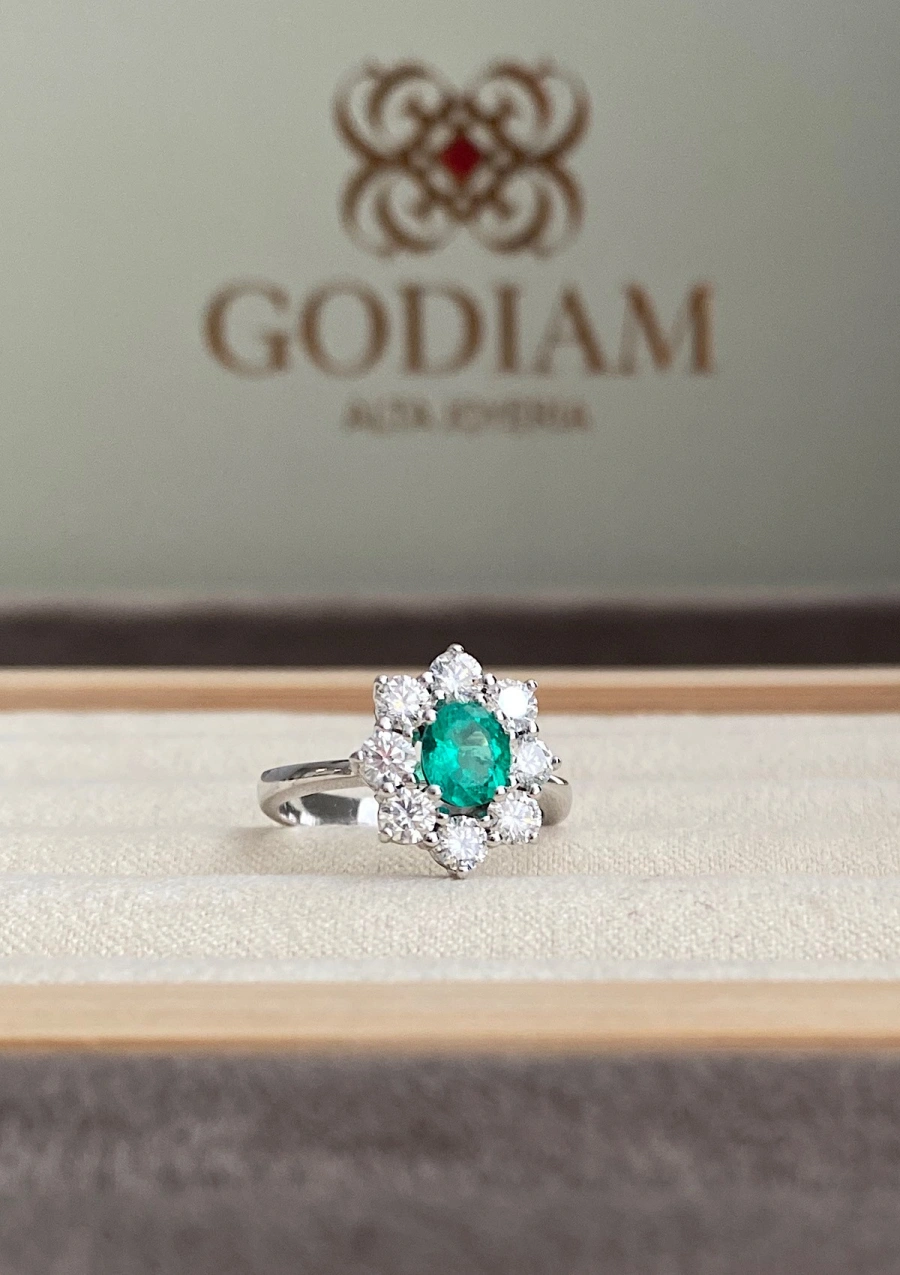 SIMONETA 18K white gold diamond and emerald rosette ring.