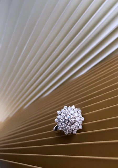 VEGA 18K white gold and brilliant cut diamonds rosette ring.