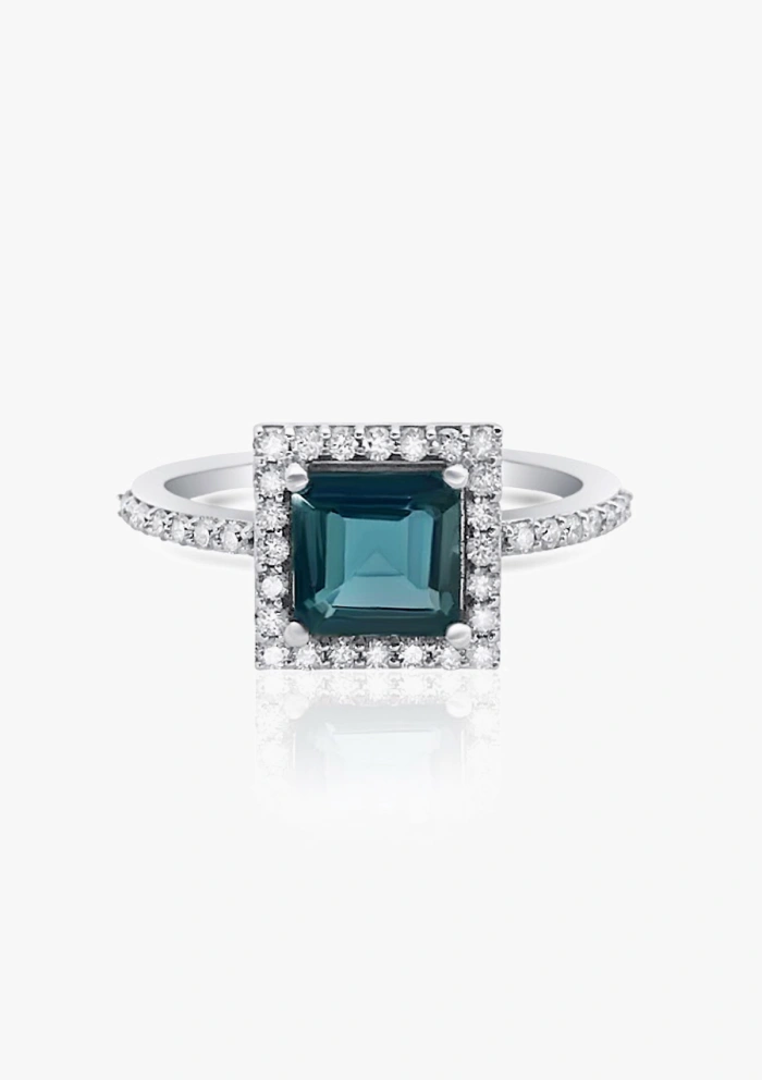 LUCÍA 18K white gold diamonds and London Blue topaz ring.