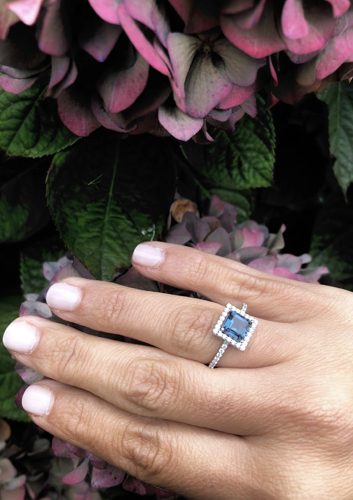 LUCÍA 18K white gold diamonds and London Blue topaz ring.