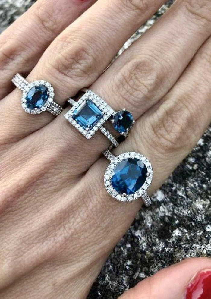 LUCÍA 18K white gold diamonds and London Blue topaz ring.