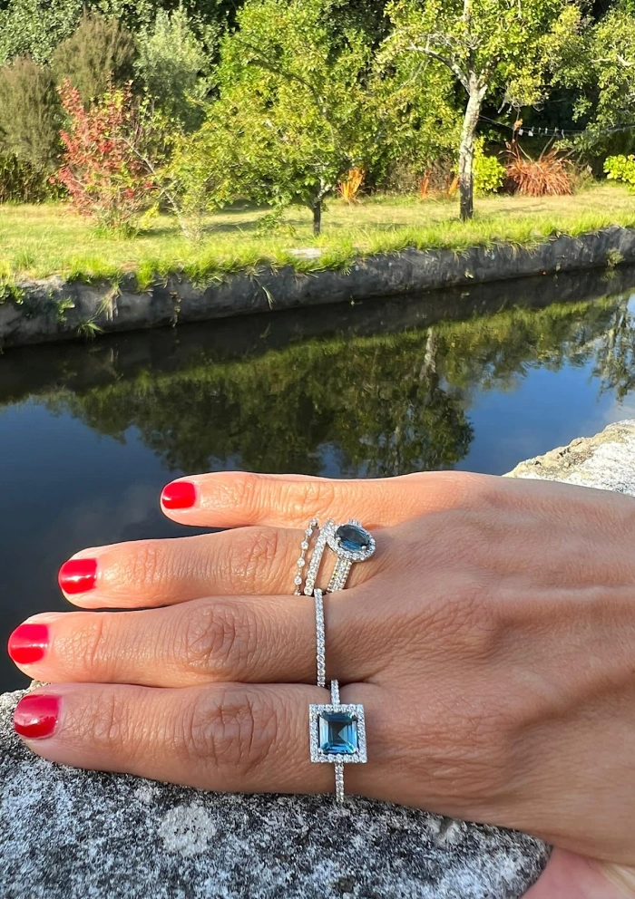 LUCÍA 18K white gold diamonds and London Blue topaz ring.