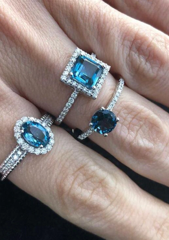 LUCÍA 18K white gold diamonds and London Blue topaz ring.