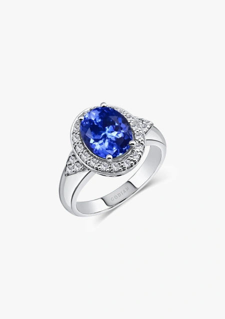 Anel ROMA em ouro branco de 18K com diamantes de lapidação brilhante e tanzanita de corte oval