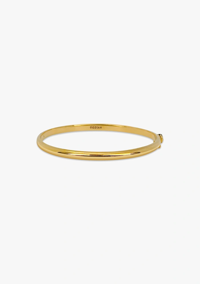 Pulsera esclava MEDIA CAÑA realizada en oro de 18 quilates