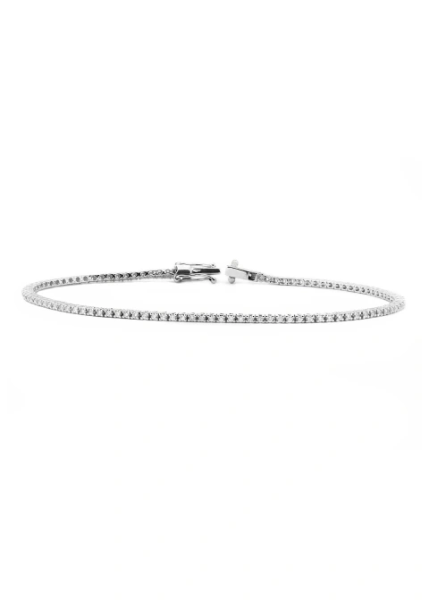1.2 MINI RIVIÊRE 18K gold tennis bracelet with diamonds.