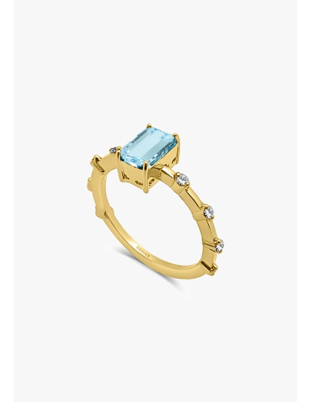 Anillo MIRANDA en oro amarillo de 18K con diamantes talla brillante y aguamarina talla baguette