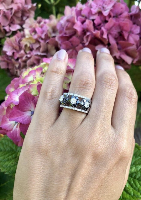 GENEVA 18K white gold ring with black & white diamonds.