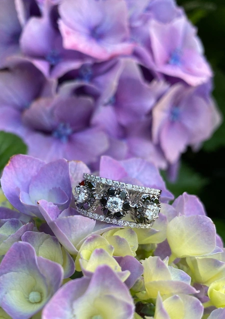 GENEVA 18K white gold ring with black & white diamonds.