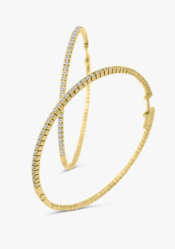 Boucles d'oreilles créoles XTRA BIG ROUND HOOPS en or 18 carats avec diamants taille brillant.