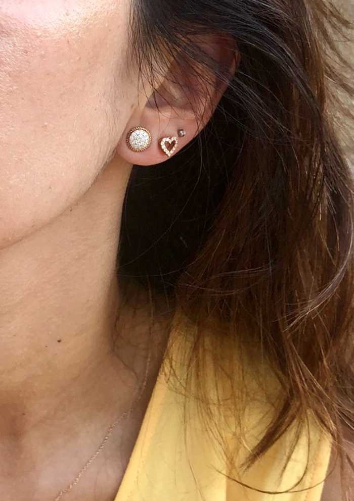 COEUR 18K gold brilliant cut diamonds stud earrings.