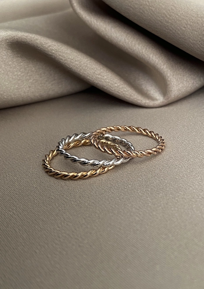 TRENZA 18K rose gold solid braided hoop wedding band.