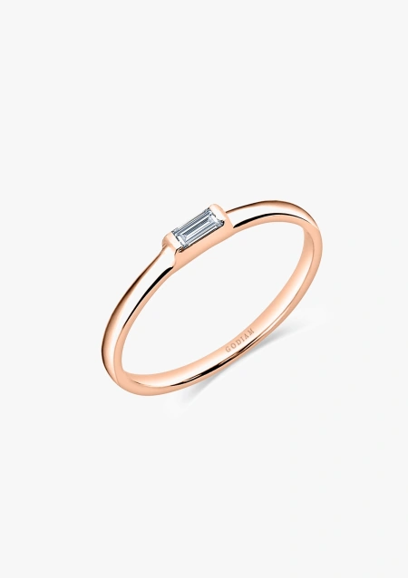 Alianza solitario EVA en oro rosa de 18K con un diamante talla baguette