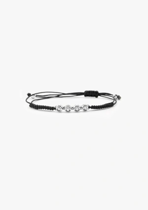 Pulsera charm NEWS mini riviêre en oro blanco de 18K con 4 diamantes talla brillante e hilo macramé