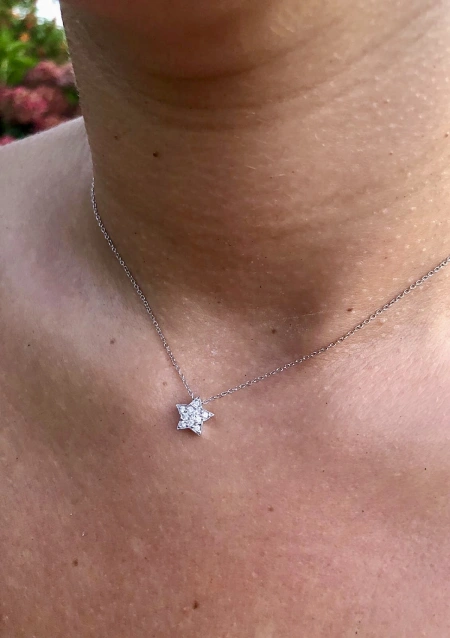 Pendentif ESTRELLA en or 18K et diamants taille brillant.