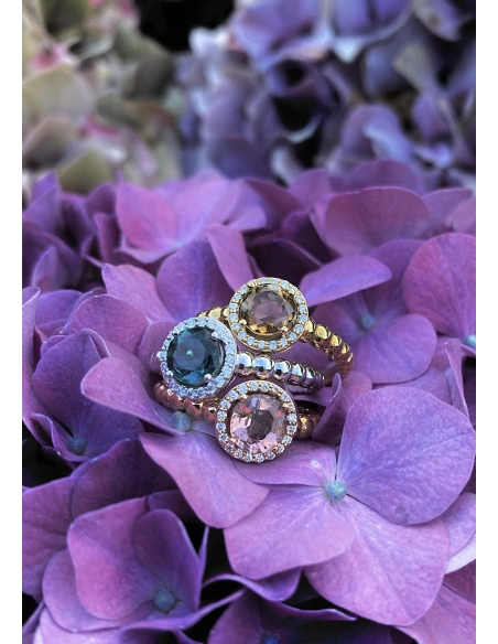 BURBUJAS 18K yellow gold diamonds and tourmaline halo ring.