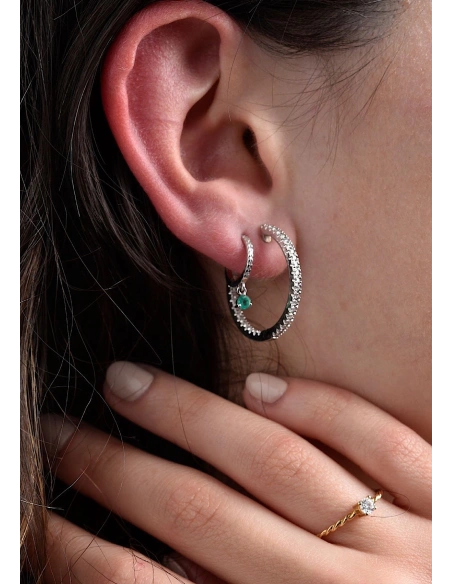 Bague TWISTY en or jaune 18K et diamant taille brillant.