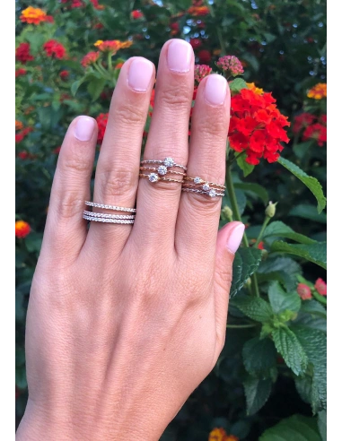 TWISTY 18K rose gold brilliant cut diamond solitaire ring.