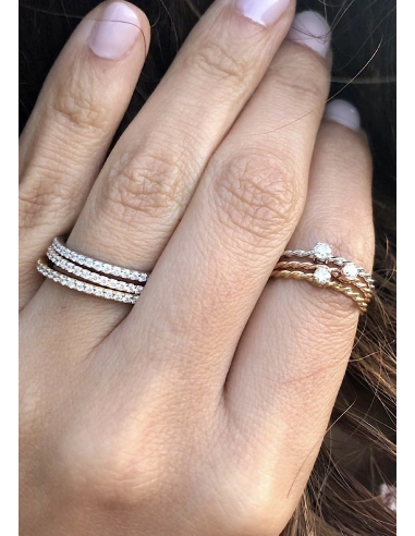 TWISTY 18K rose gold brilliant cut diamond solitaire ring.